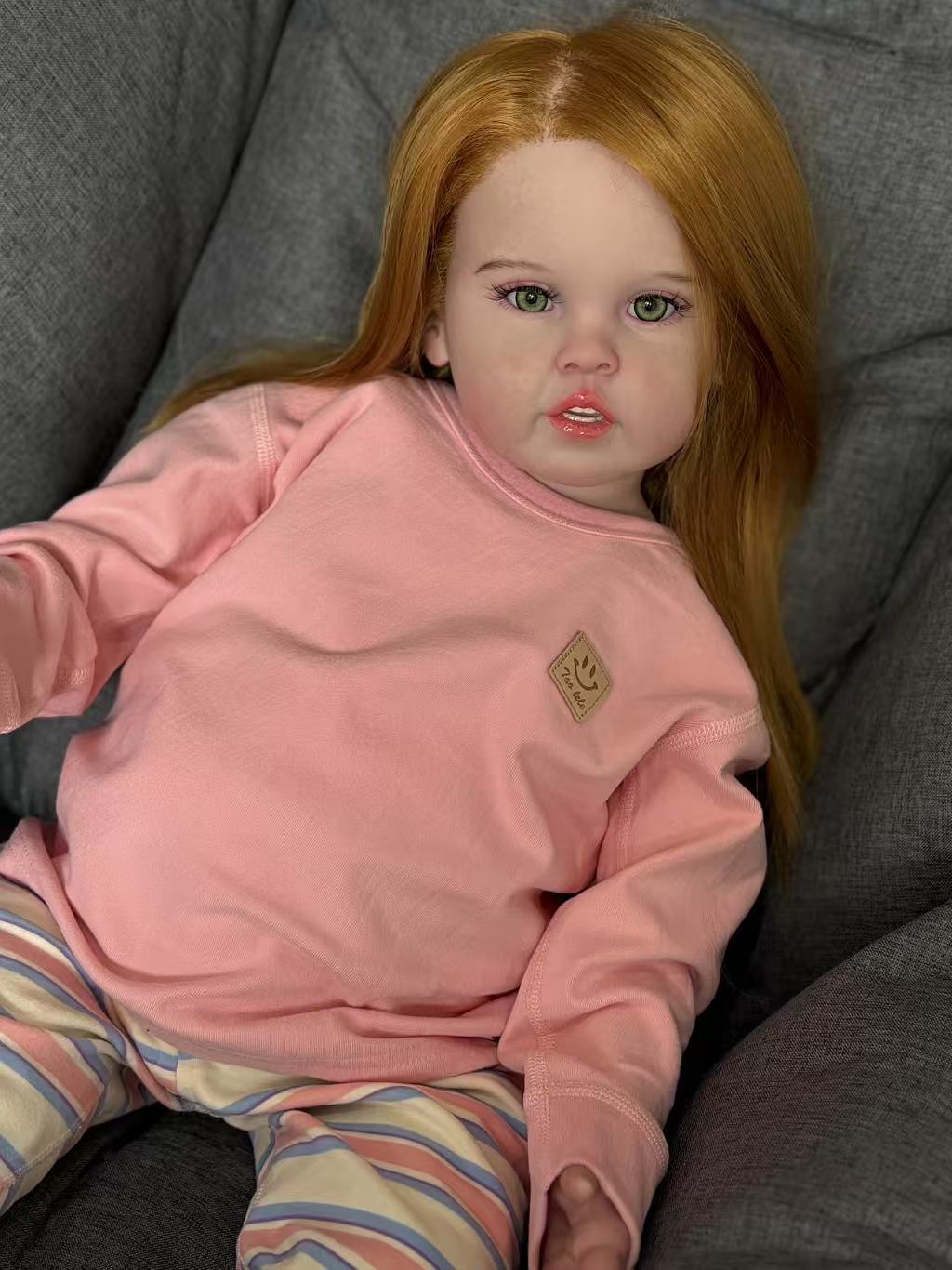 Realistic Orange-Haired Reborn Toddler Doll | 28-inch Lifelike Collectible with Soft Body
