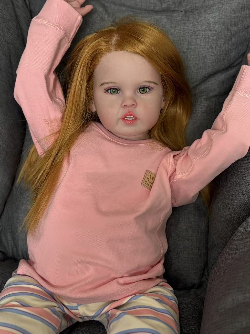 Realistic Orange-Haired Reborn Toddler Doll | 28-inch Lifelike Collectible with Soft Body