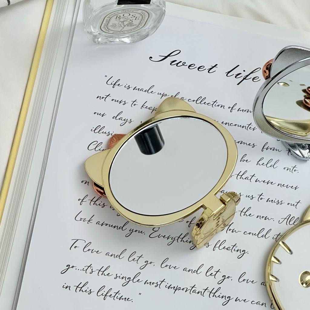 Cute Cat Foldable Hand Mirror - Portable Metallic Makeup Mirror for Travel and Daily Use