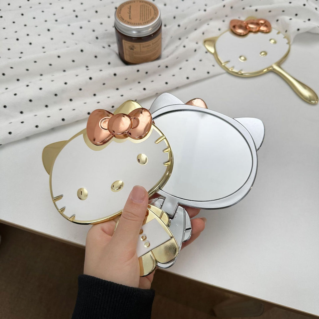 Cute Cat Foldable Hand Mirror - Portable Metallic Makeup Mirror for Travel and Daily Use